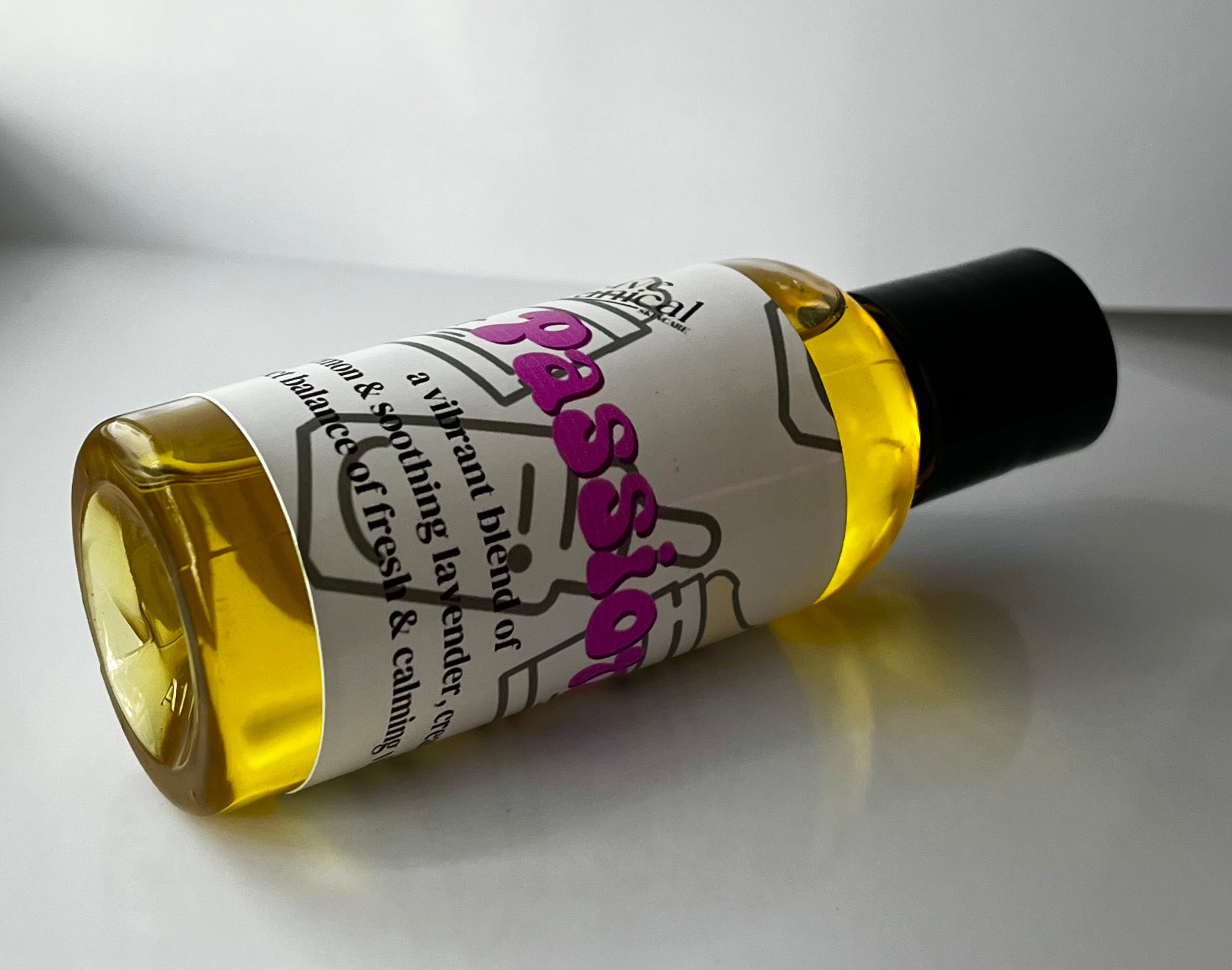 Body Oil with a label on a reflective surface